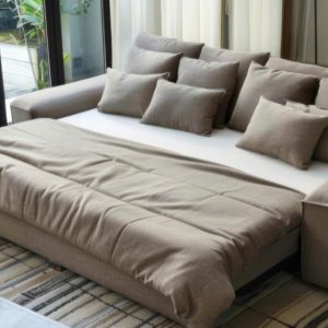 Maximize space with a stylish sofa bed. Perfect for multi-purpose rooms, it offers comfortable seating by day and seamlessly transforms into a cozy bed by night.